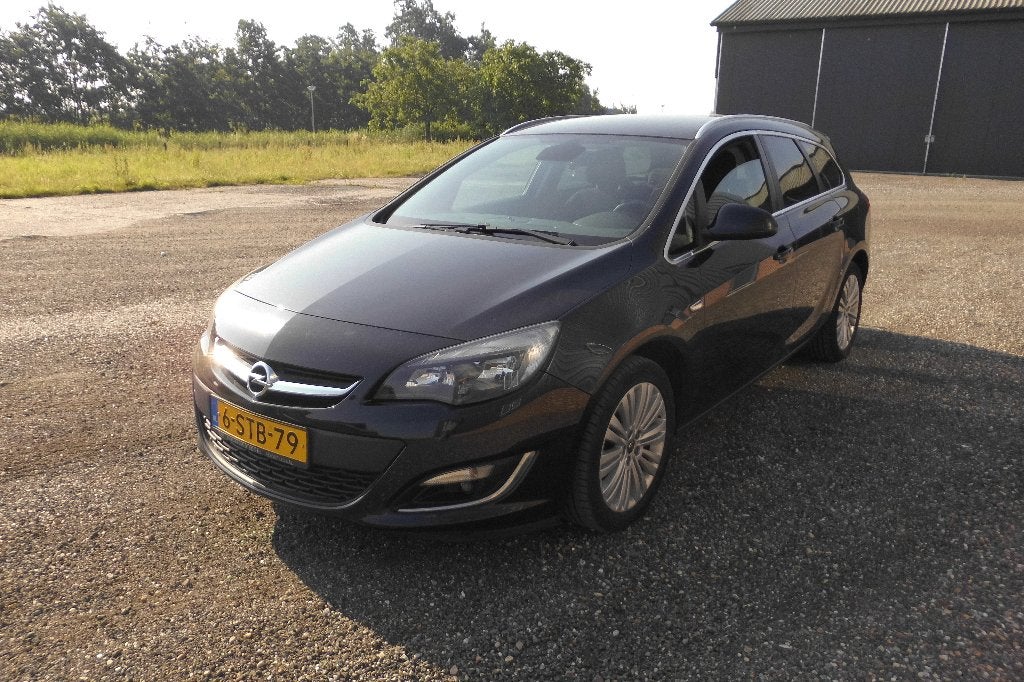 Opel Astra 1.4 Turbo 88KW Sports Tourer  Bj 2013 Zwart, Auto's, Voorwielaandrijving, Euro 5, Stof, Zwart
