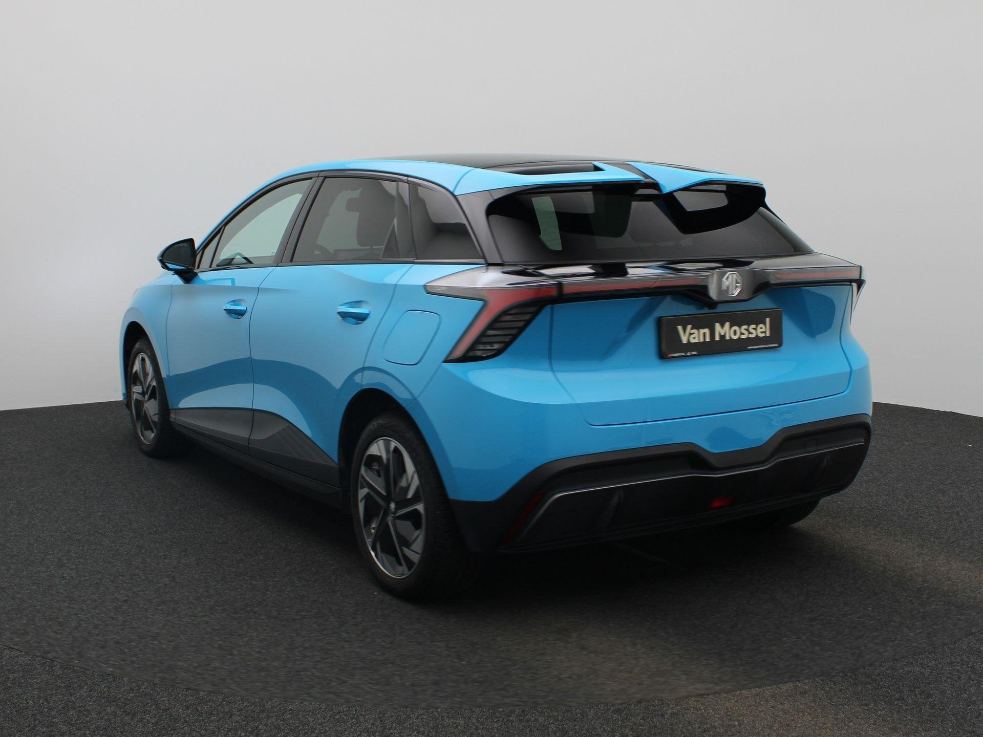 MG MG4 64 kWh 204Pk Luxury | Navigatie | Apple & Android Car, Auto's, Automaat, Gebruikt, 1675 kg, Blauw