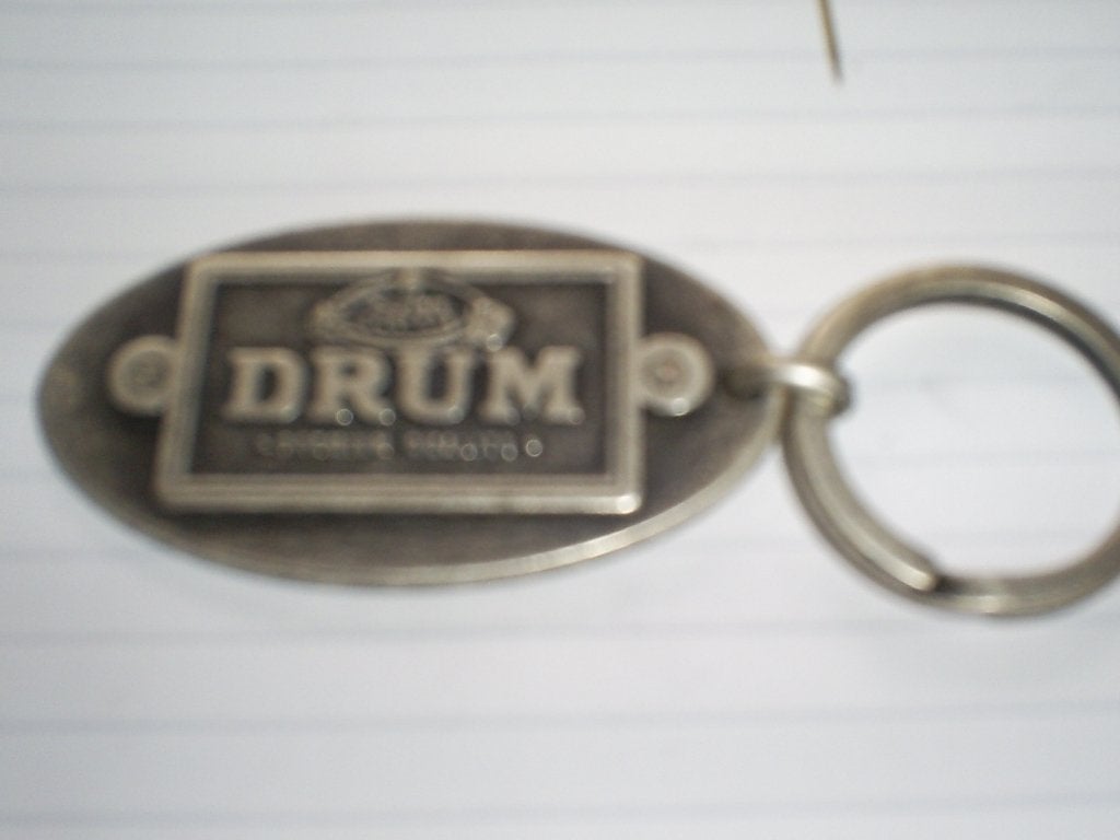 2 sleutelhanger DRUM ( shag v Douwe Egberts) en OPA metaal, Verzamelen, Ophalen of Verzenden, Gebruikt, Merk