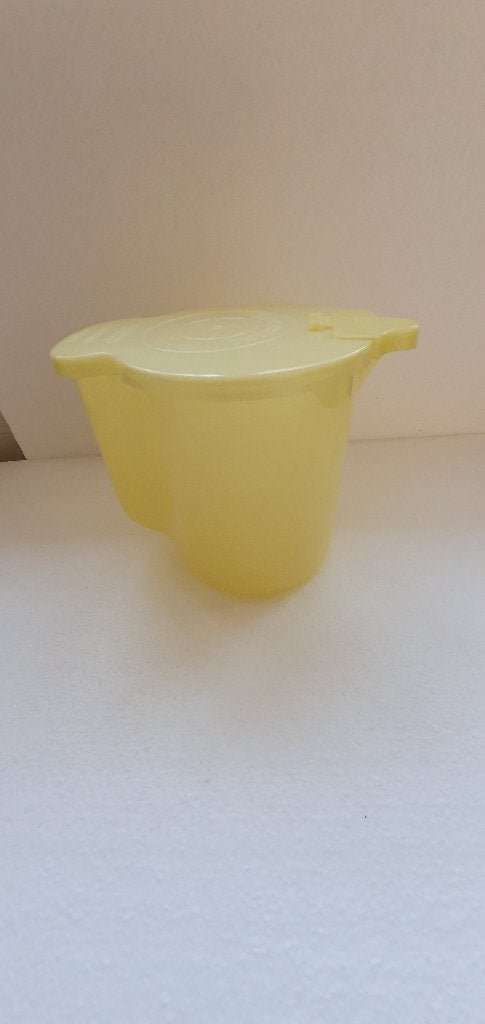 Vintage Tupperware melkkan., Gebruikt, Geel, Beker of Kan, Ophalen of Verzenden