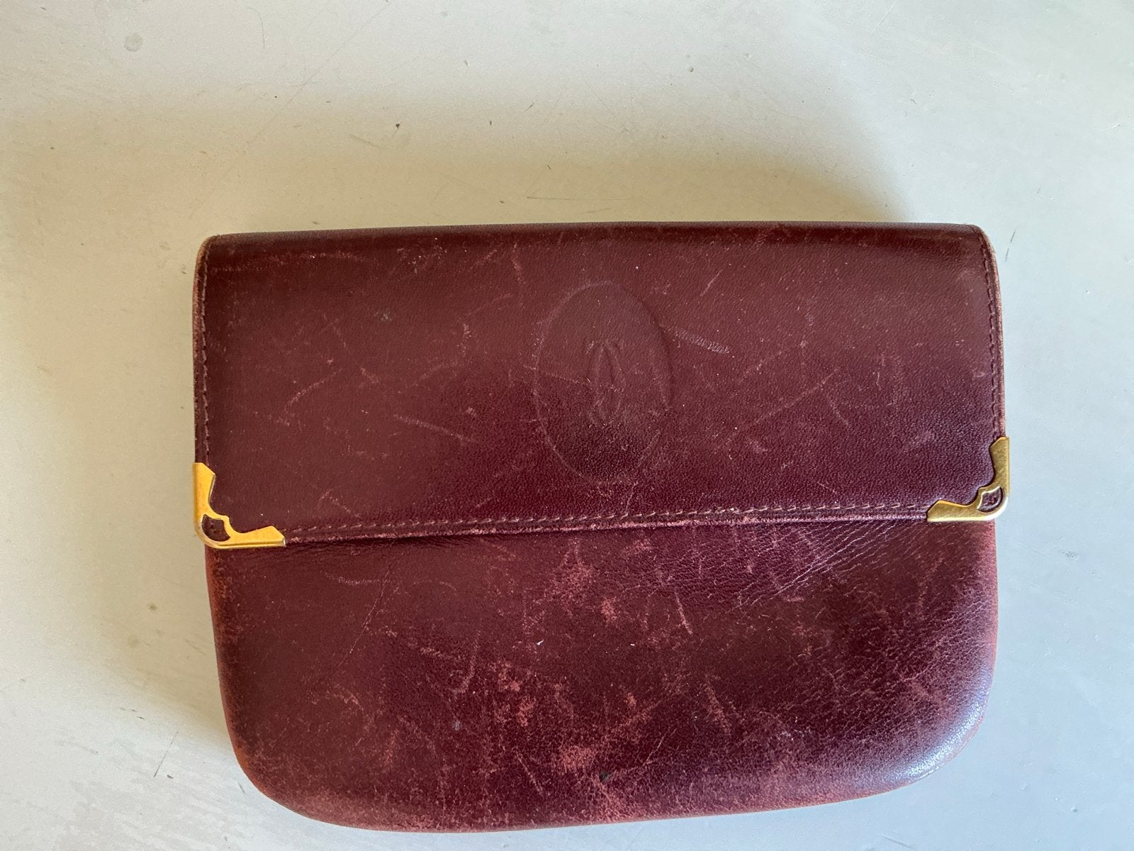 Vintage Cartier Portemonnee - Bordeauxrood Leer, Sieraden, Tassen en Uiterlijk, Portemonnees, Overige merken, Gebruikt, Bruin