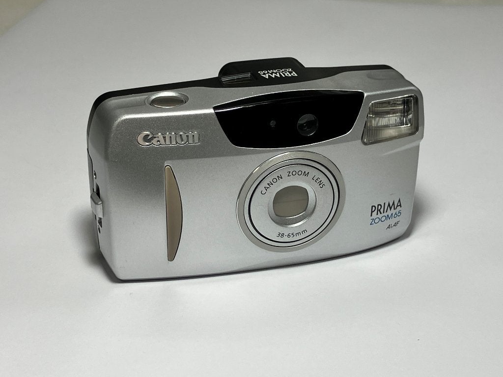 Analoge compact camera's, Ophalen of Verzenden, Gebruikt, Spiegelreflex, Overige Merken