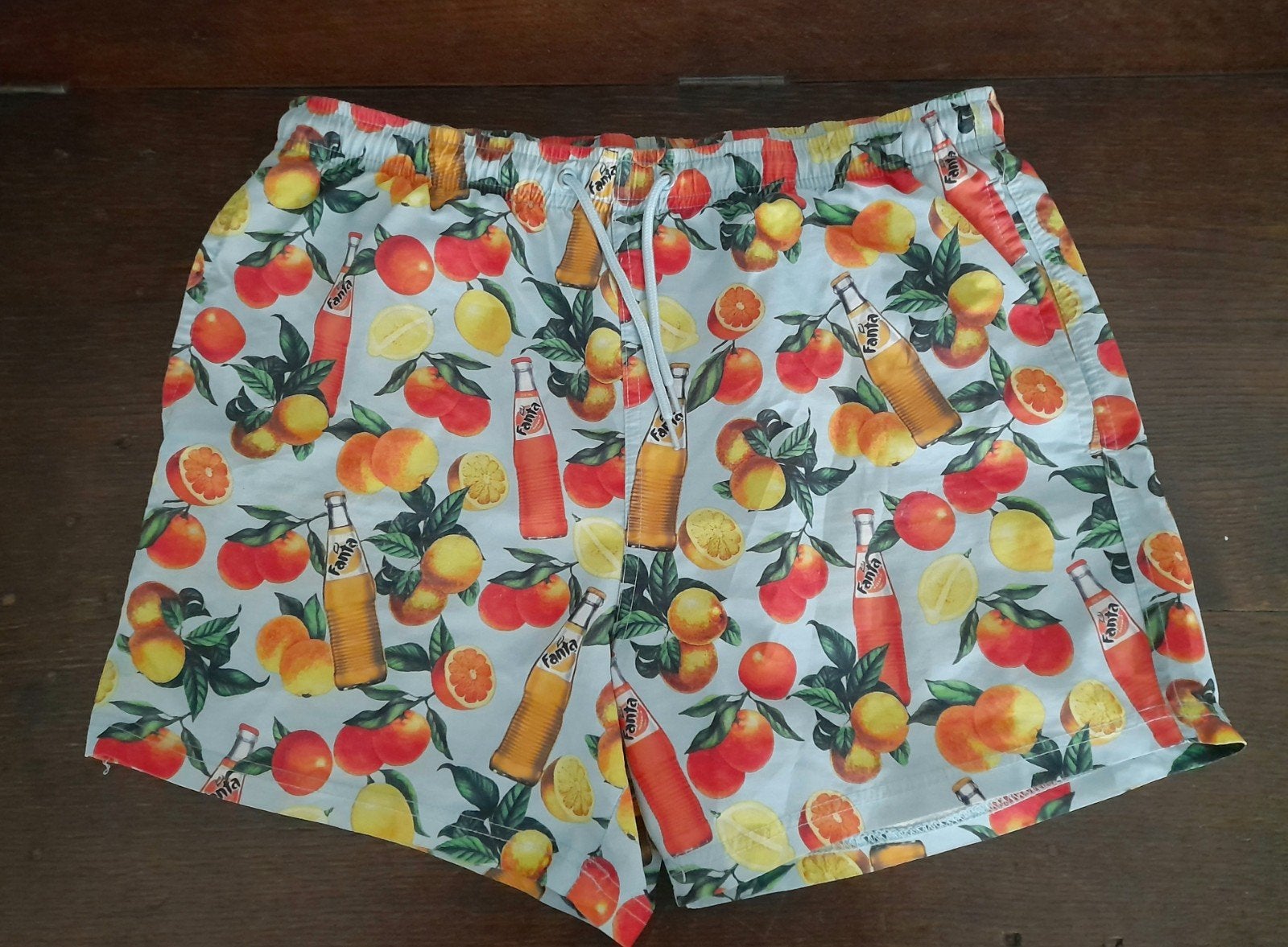 Zeldzame authentiek nieuw Coca Cola zwemshort m Fantaflesjes, Ophalen of Verzenden, Oranje
