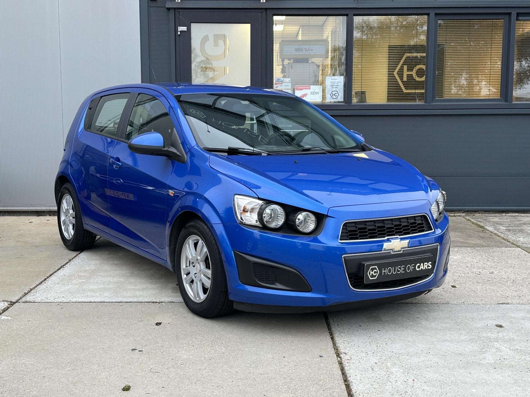 Chevrolet Aveo 1.2 LT 5-Deurs Airco Cruise Lichtmetaal NAP, Auto's, Euro 5, 4 cilinders, Blauw, 1229 cc