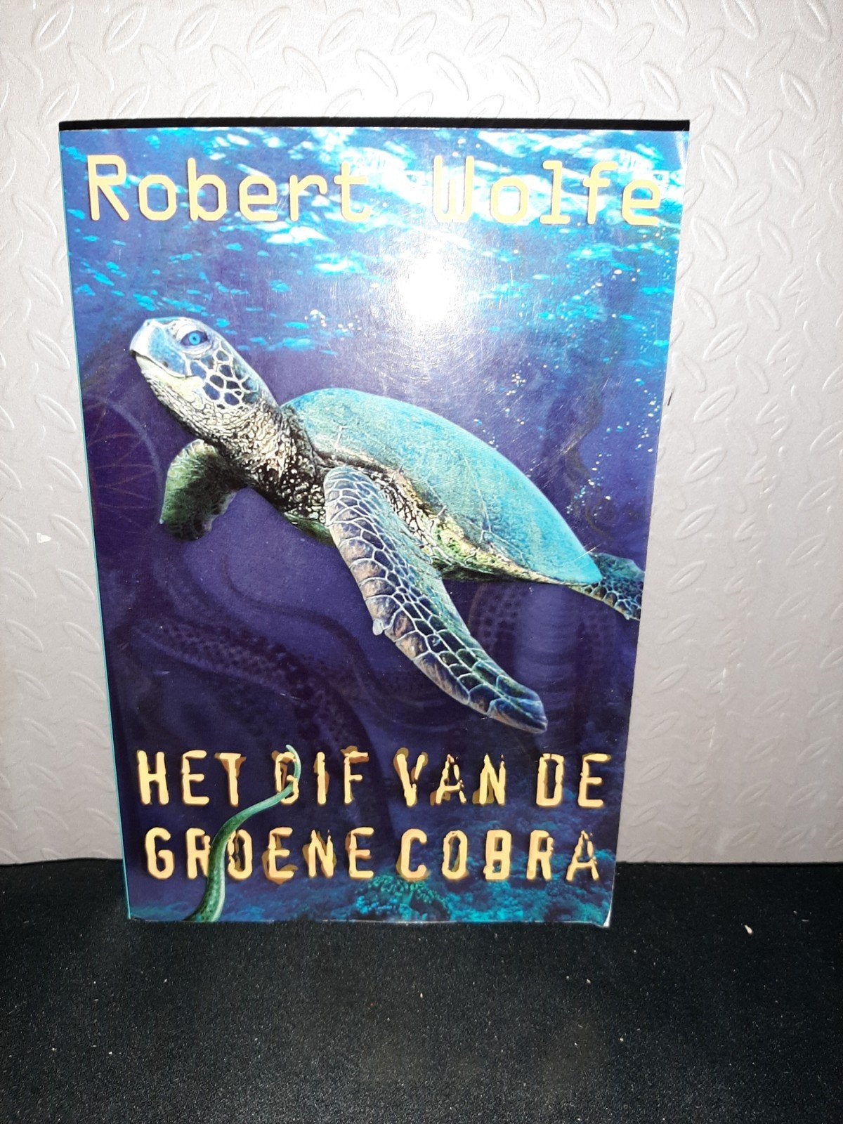 Het Gif van de Groene Cobra - Robert Wolfe, Ophalen of Verzenden, Zo goed als nieuw