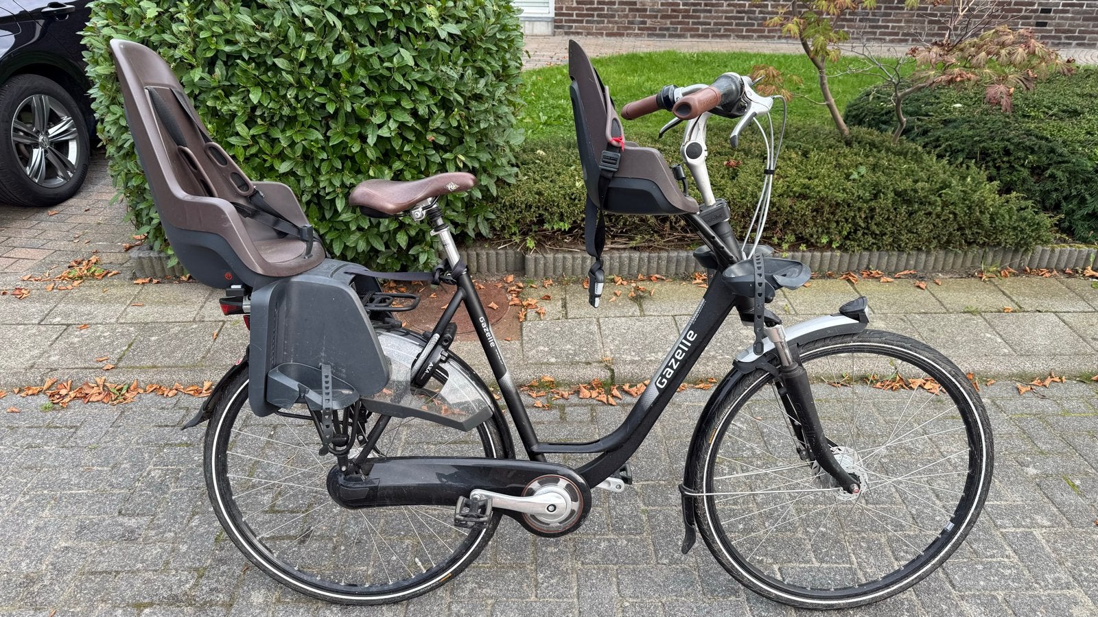 Foto 2 van Gazelle dames stadsfiets met Bobike kinderzitjes
