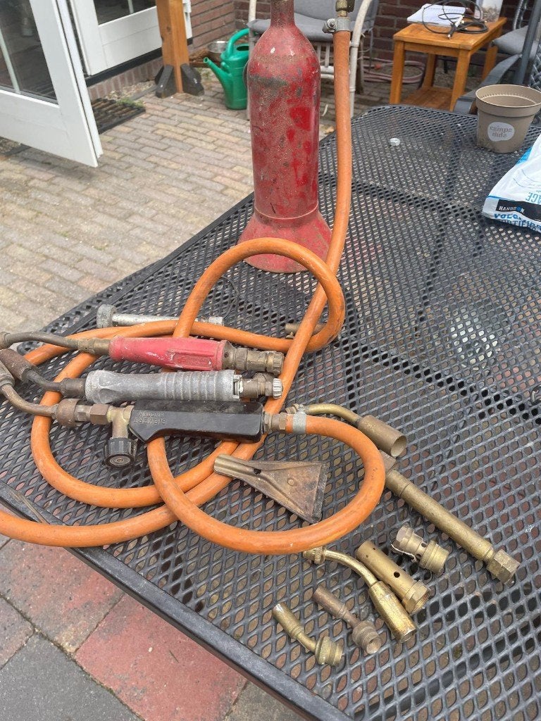 gasbrander met toebehoren, Ophalen