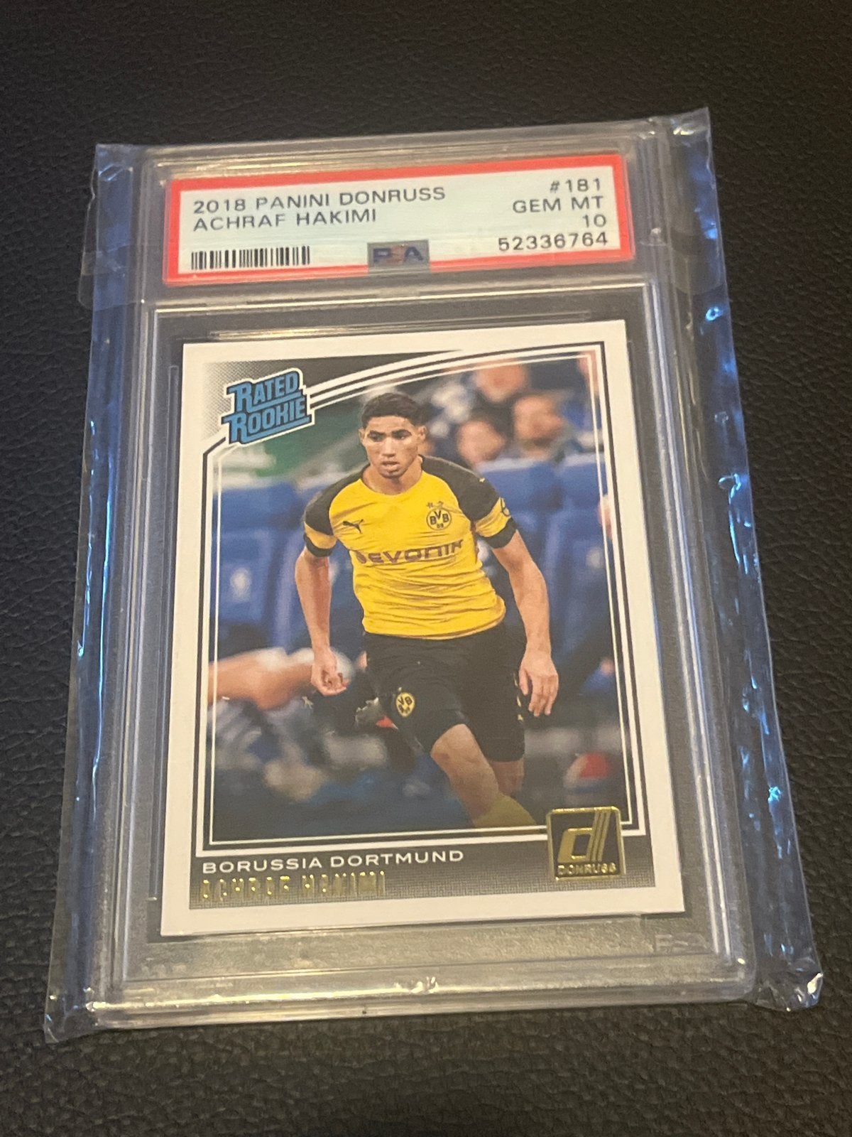 PSA 10 Achraf Hakimi #181 2018 Panini Donruss Rookie, Verzamelen, Sportartikelen en Voetbal, Ophalen of Verzenden, Nieuw, Buitenlandse clubs