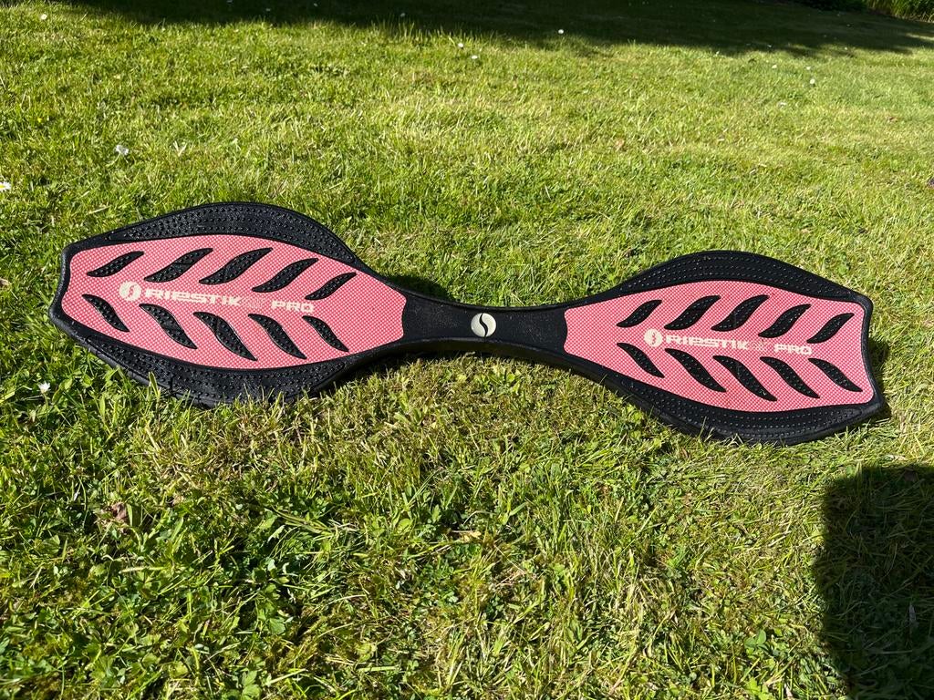 Razor RipStik Pro Waveboard - Zwart/Roze, Sport en Fitness, Skateboarden, Zo goed als nieuw, Waveboard, Ophalen of Verzenden