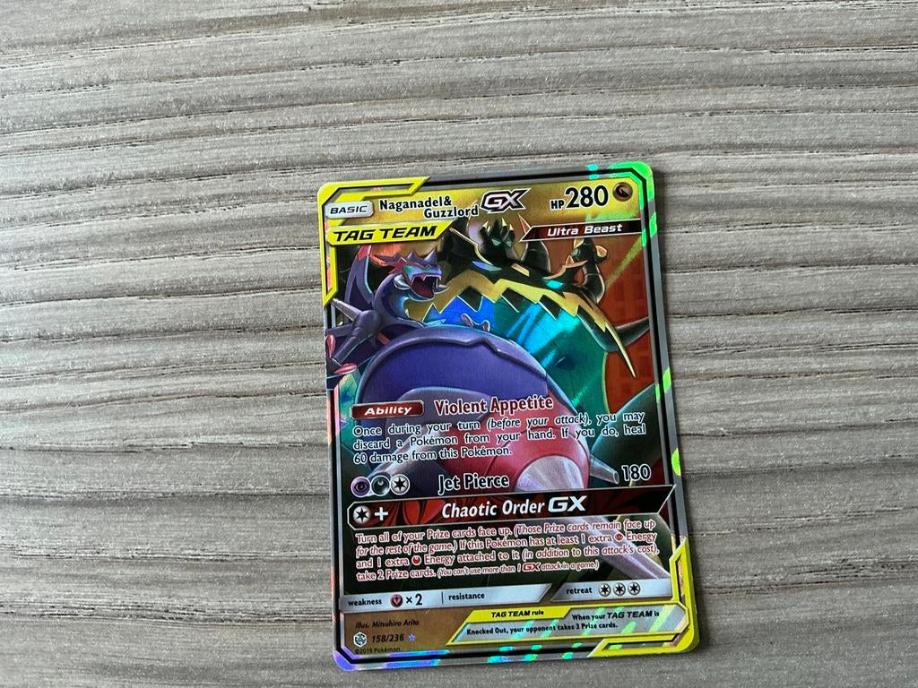 Pokémon Kaart: Naganadel & Guzzlord GX TAG TEAM, Ophalen of Verzenden, Zo goed als nieuw, Losse kaart, Foil