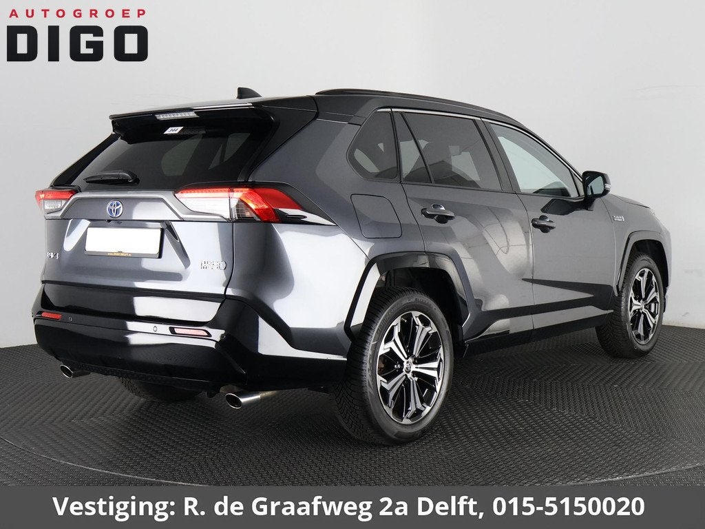 Toyota RAV4 2.5 Plug-in Hybrid AWD Bi-Tone Plus | 1500 KG tr, Auto's, Toyota, Automaat, Gebruikt, 4 cilinders, Bedrijf