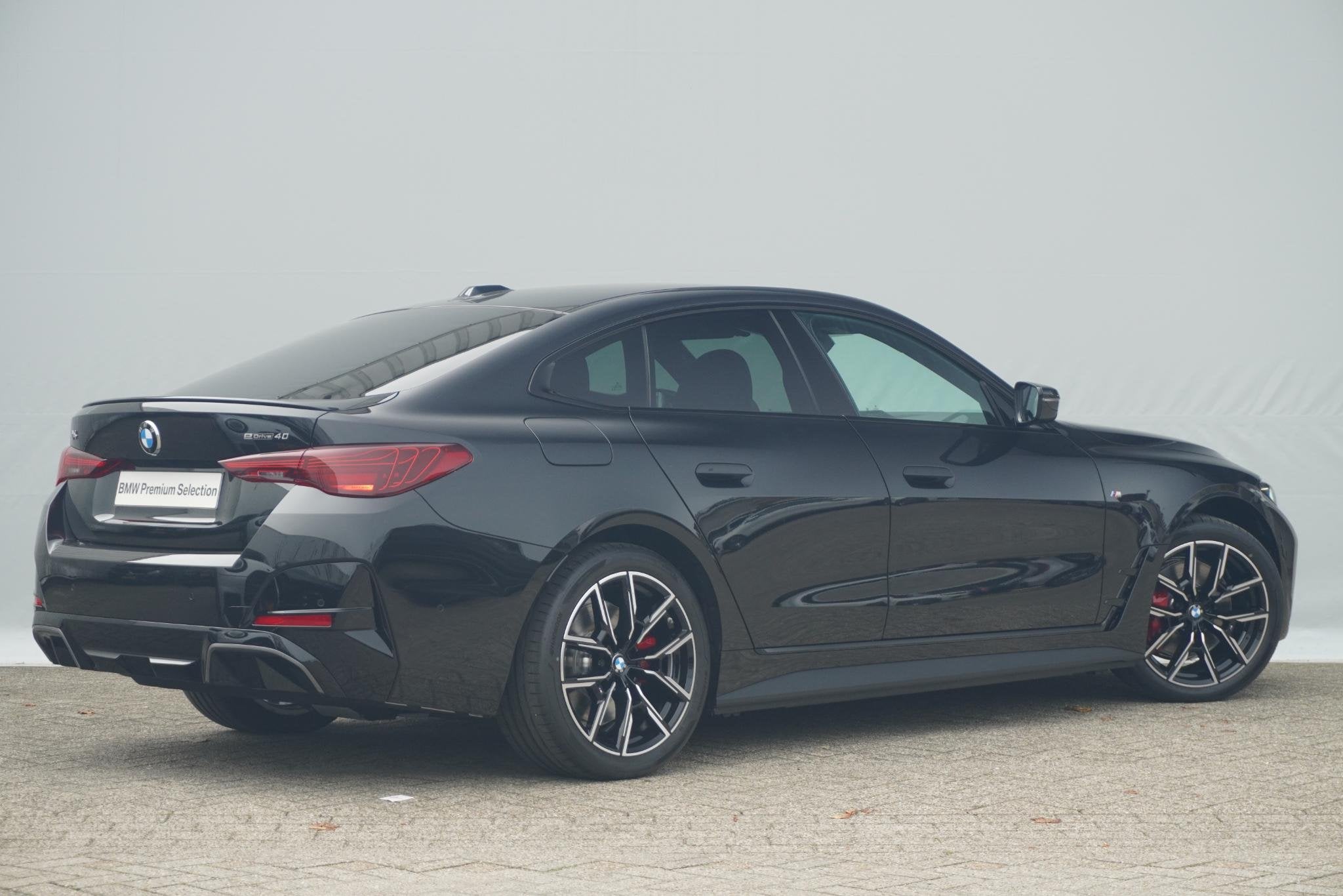 BMW i4 eDrive40 | Comfort Pack, Auto's, Achterwielaandrijving, 510 min, Zwart, Met garantie (alle)