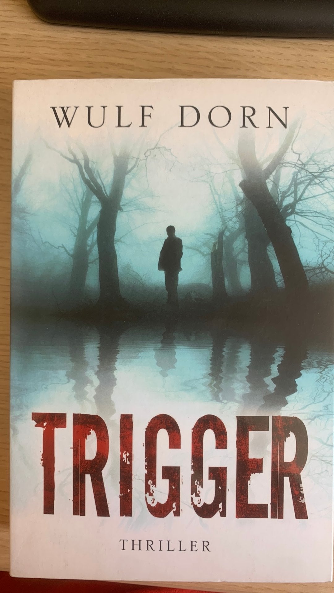 Boek Trigger van Wulf Dorn, Ophalen, Zo goed als nieuw, Europa overig