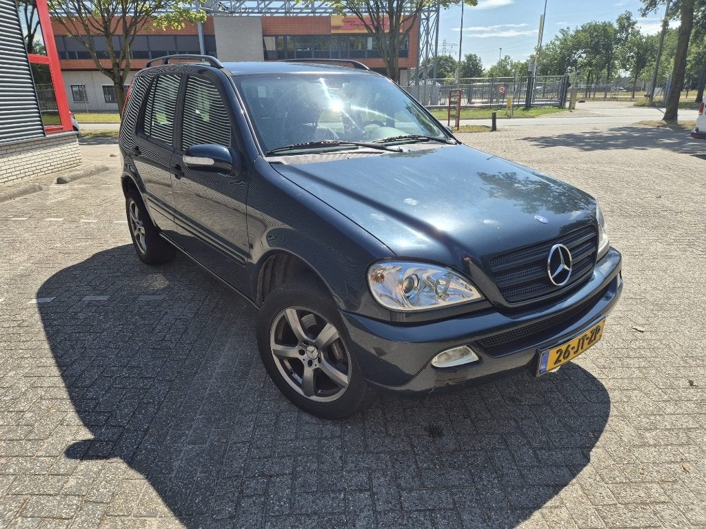 Mercedes-Benz M-Klasse 3.2 Ml320 4MATIC AUT 2002 Zwart, Auto's, Automaat, Zwart, 138 €/maand, 7 stoelen