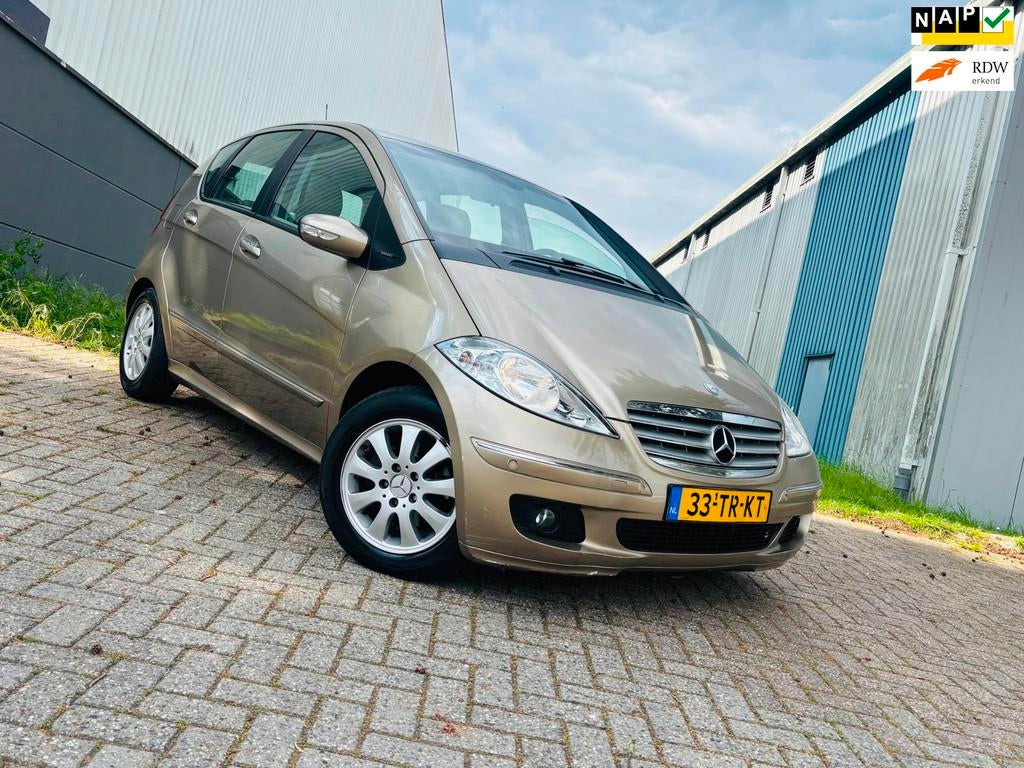 Mercedes-Benz A-klasse 150 Elegance Automaat,Airco,Navi,Leer, Auto's, 15 km/l, Beige, Beige, Parkeersensor