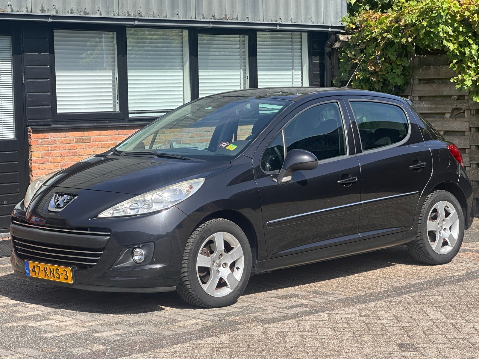 Peugeot 207 1.6 VTI 16V 5DRS 2010 Zwart NAP, Auto's, Voorwielaandrijving, Stof, Zwart, Origineel Nederlands