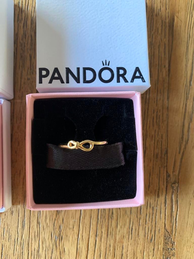 Pandora ring en oorbellen set - Infinity collectie, Met kristal, Nieuw, Ophalen of Verzenden, 17 tot 18