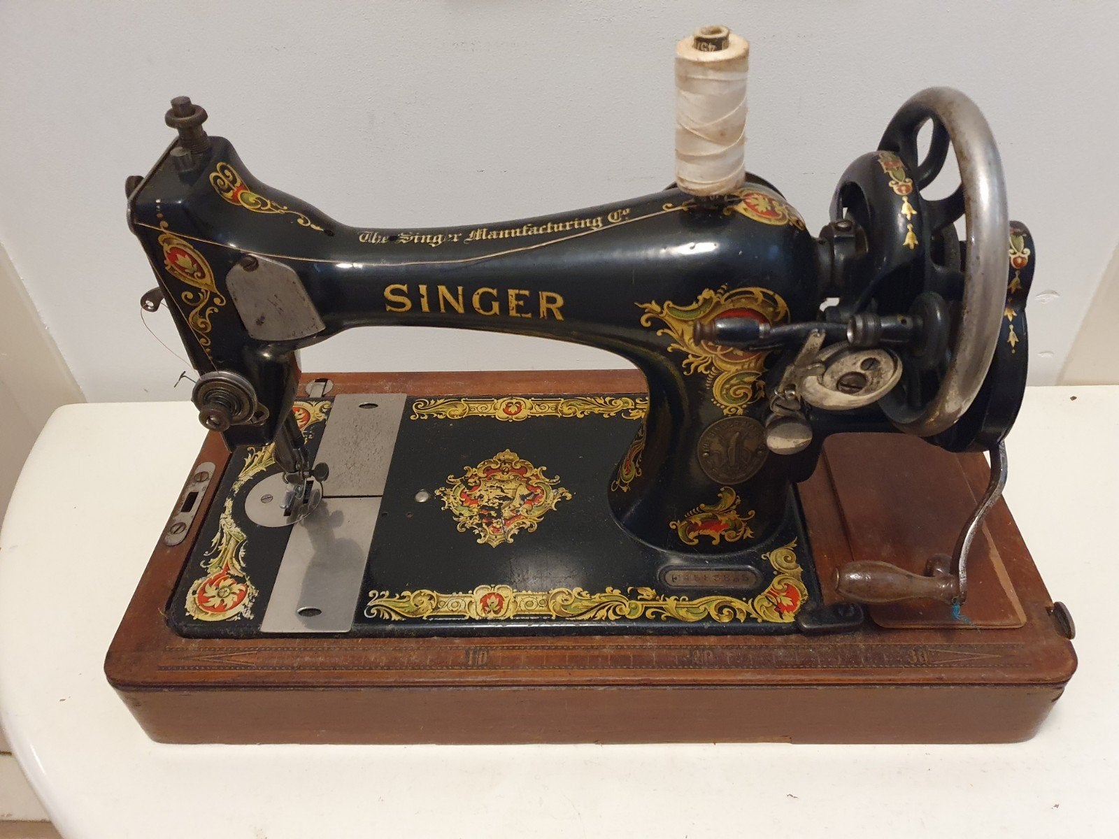 Antieke Singer handnaaimachine (1927) met koffer, Ophalen
