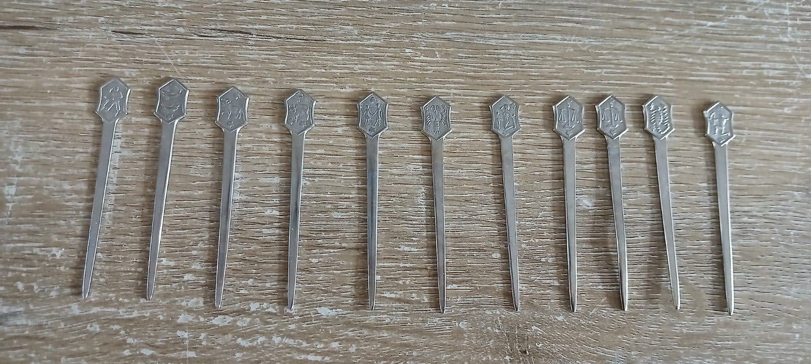 sterrenbeeld prikkers unox jaren 70 cocktailprikkers, Antiek en Kunst, Ophalen of Verzenden
