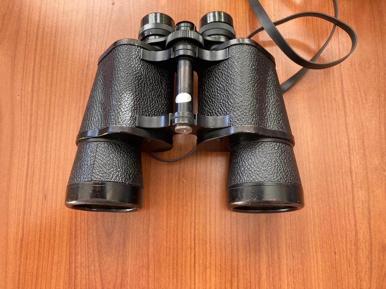 Verrekijker 10x50 met draagriem., Audio, Tv en Foto, Optische apparatuur | Verrekijkers, Ophalen, Zo goed als nieuw, 8 tot 12x