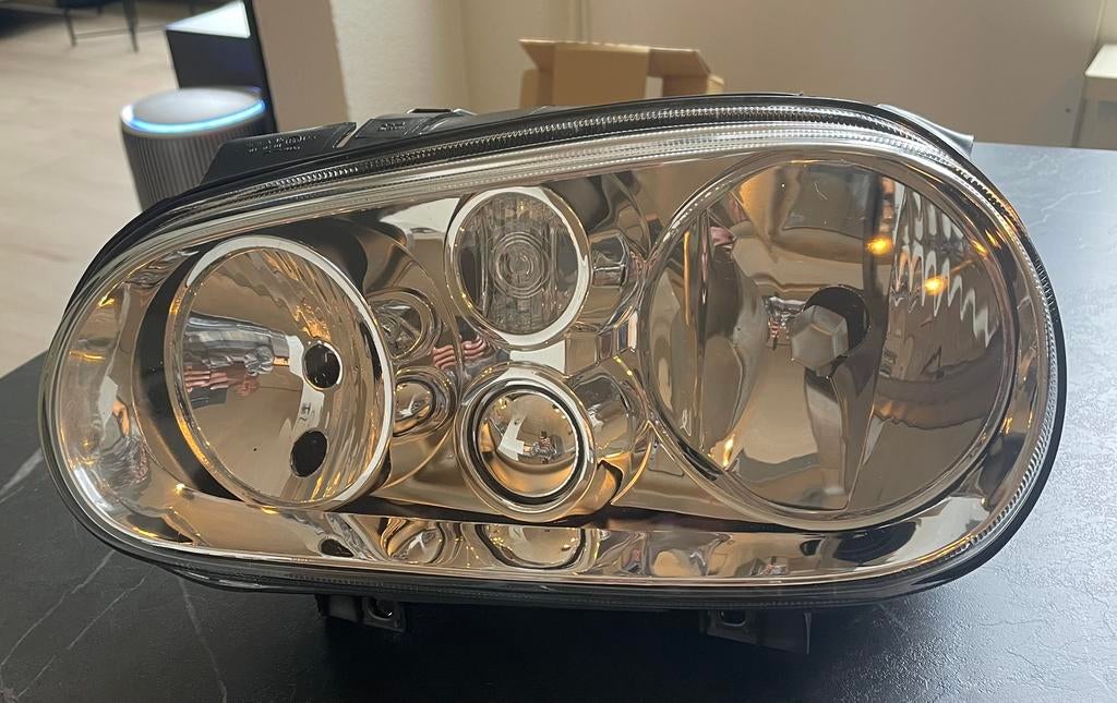 Te koop nieuwe koplamp VW golf 4 links, Auto-onderdelen, Verlichting, Ophalen of Verzenden, Nieuw