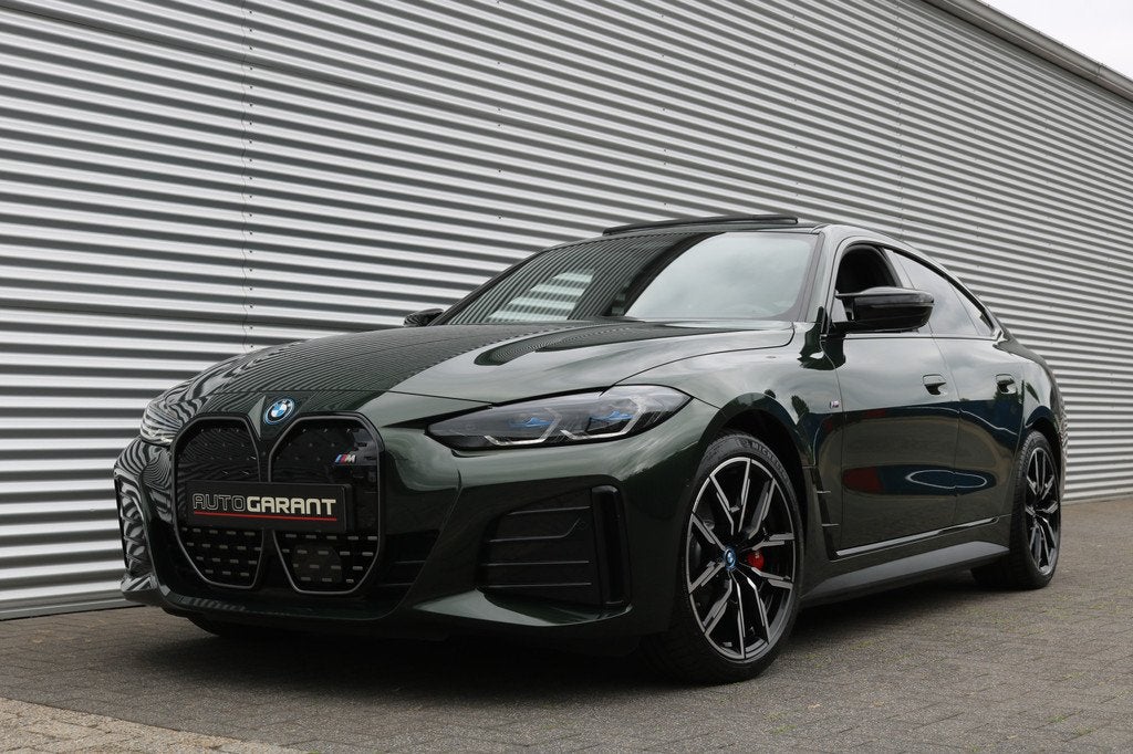 BMW i4 M50 High Executive 84 kWh 544PK (Schuifdak Sportleder, Auto's, BMW, 12 maanden, Gebruikt, Zwart, Leder