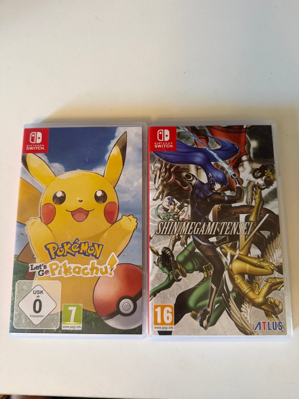 Pokémon Let's Go Pikachu & Shin Megami Tensei Nintendo Switc, 1 speler, Ophalen of Verzenden, Zo goed als nieuw, Role Playing Game (Rpg)