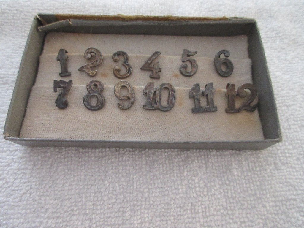 Verzilverde tafelnummers Gero 1 t/m 12 in doosje., Ophalen of Verzenden
