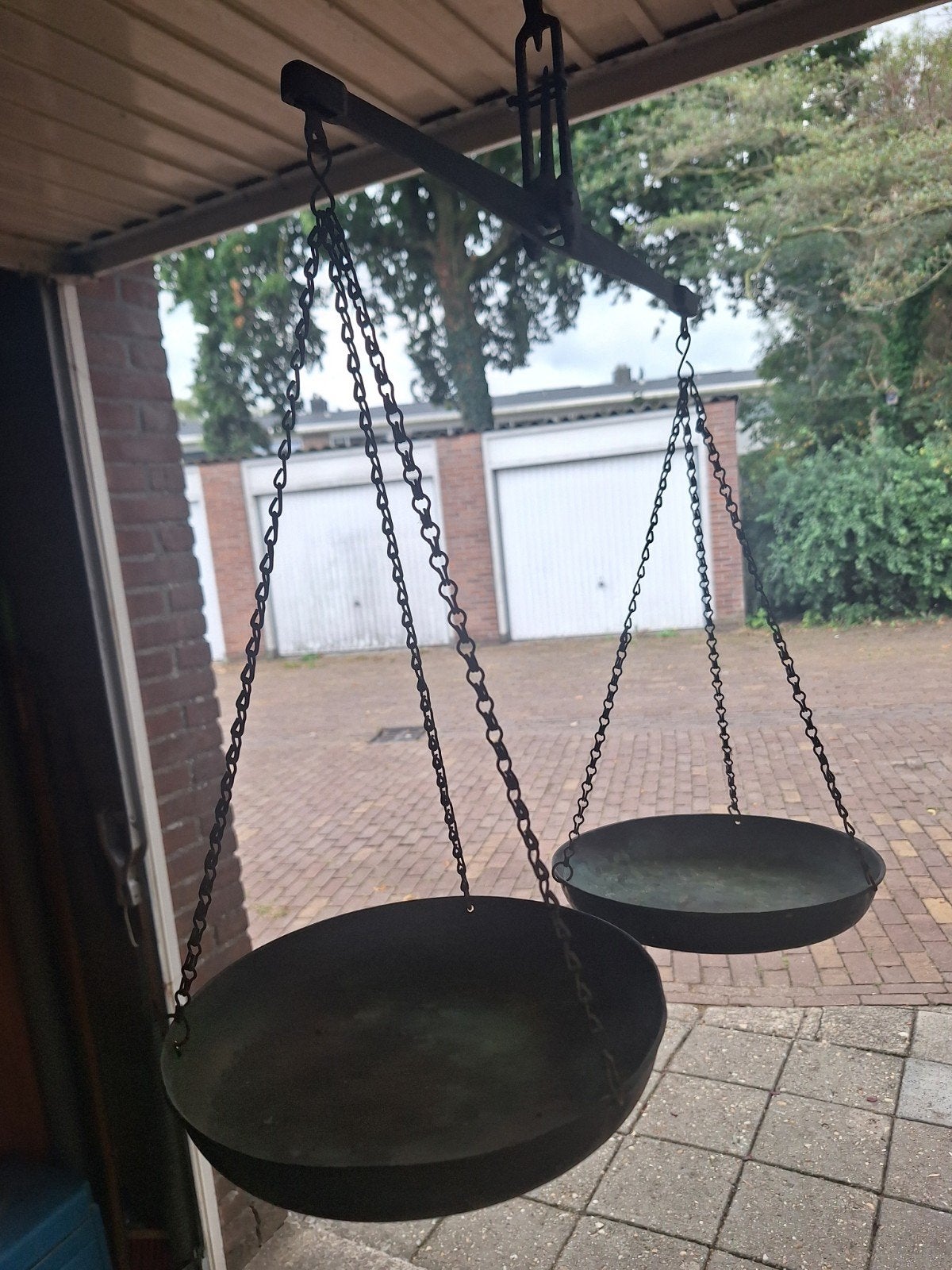 Oude weegschaal ., Ophalen