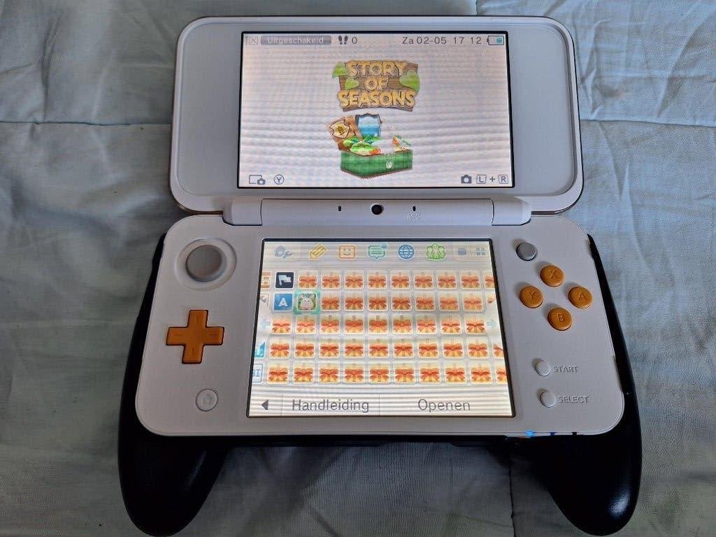 New Nintendo 2DS XL – in absolute nieuwstaat (wit/oranje), Spelcomputers en Games, Spelcomputers | Nintendo 2DS en 3DS, Blauw