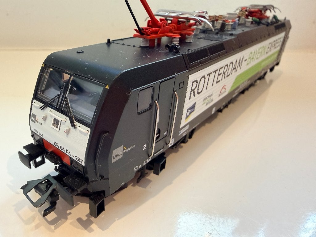 Marklin 39865 H0 BR189/ES64 Rotterdam-Bayern Express DEFECT, Ophalen, Wisselstroom, Locomotief, Nieuw