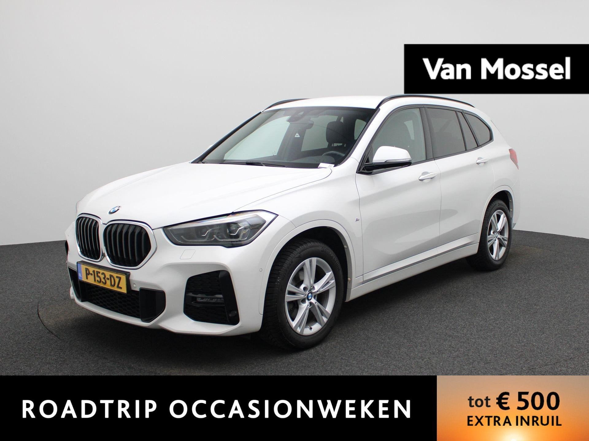 BMW X1 sDrive18i High Executive | M-SPORT | CAMERA | NAVIGAT, Auto's, 12 maanden, Stof, Gebruikt, Wit