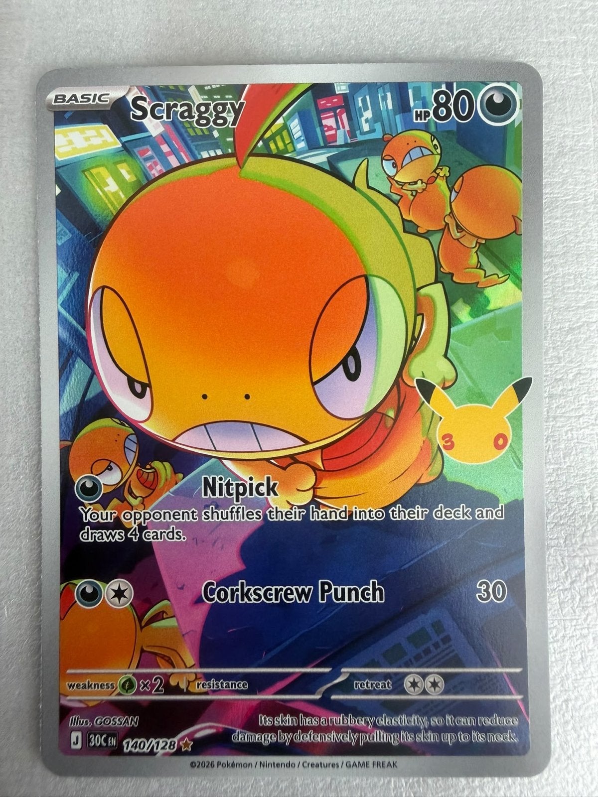 Pokémon Kaart Scraggy 140/128 Celebrations, Ophalen of Verzenden, Zo goed als nieuw, Losse kaart