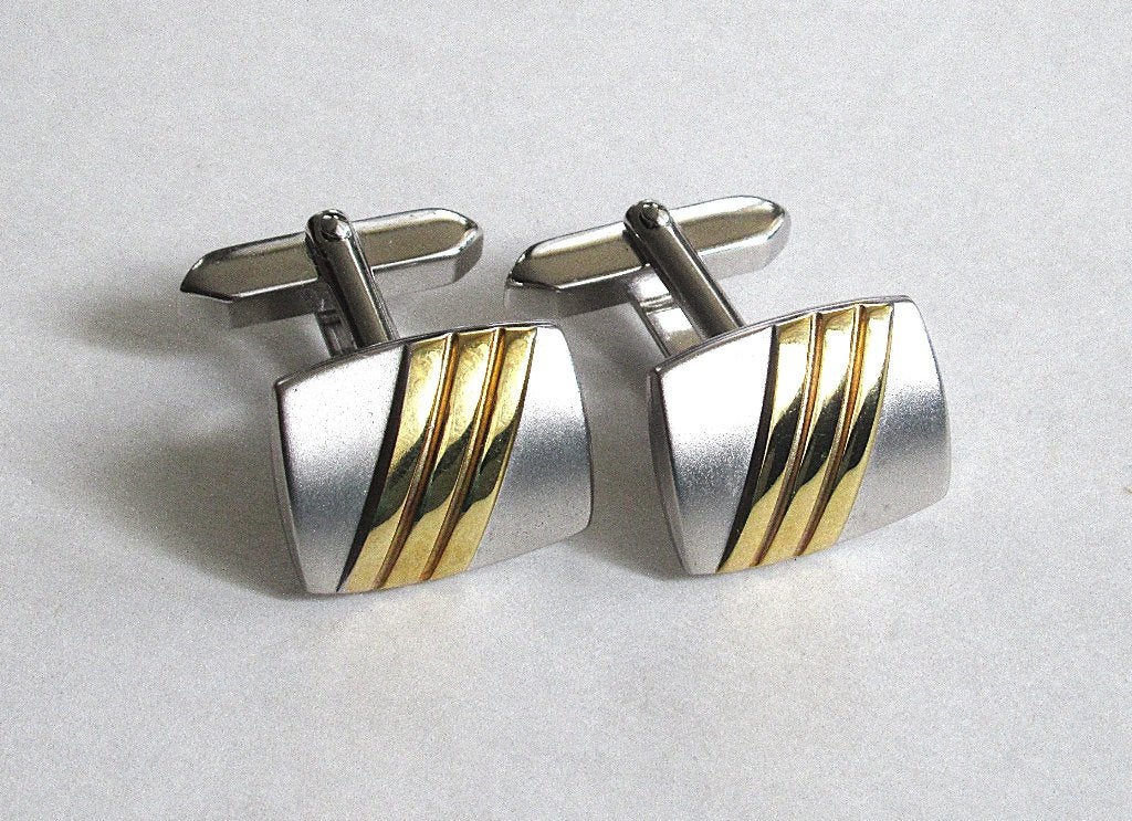 Stijlvolle zilver-gold strippen design manchetknopen, nieuw., Ophalen of Verzenden, Zo goed als nieuw, Overige materialen