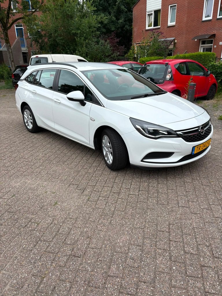 Opel Astra Sports Tourer 1.0 Turbo Business | 102.000km, Auto's, Opel, Voorwielaandrijving, 620 kg, Wit, Origineel Nederlands