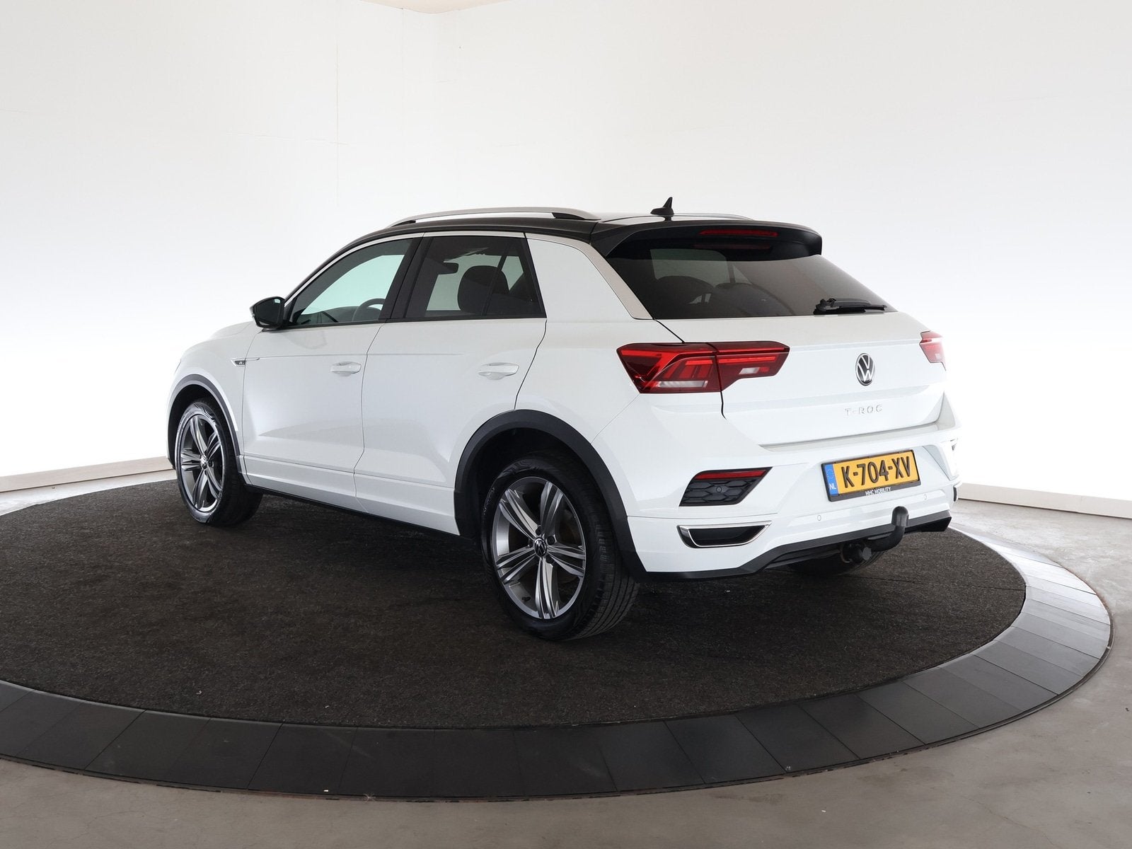 Volkswagen T-Roc 1.5 TSI Sport Business R (bj 2021), Auto's, Automaat, 4 cilinders, 150 pk, Leder en Stof