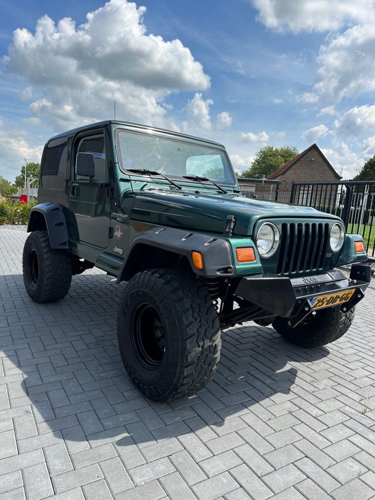 Jeep Wrangler 4.0 I sahara 1999, Auto's, Jeep, 450 kg, 2000 kg, 4 stoelen, Origineel Nederlands