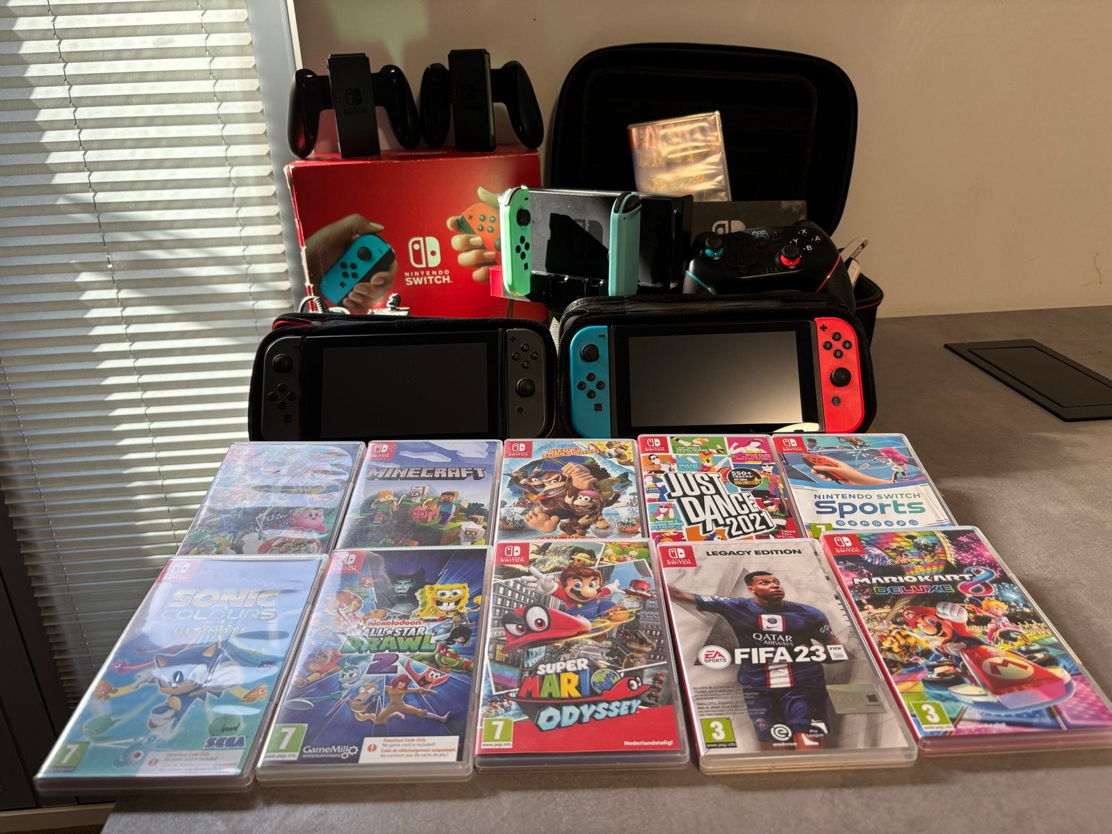 Nintendo Switch 2x Switch 1, 10 games helemaal compleet!, Spelcomputers en Games, Ophalen of Verzenden, Switch Original, Met 3 controllers of meer