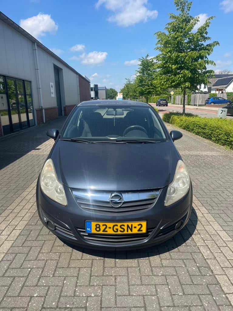 Opel Corsa 1.2 16V 3D WR 2006 Blauw, Voorwielaandrijving, 40 €/maand, Zwart, 4 cilinders
