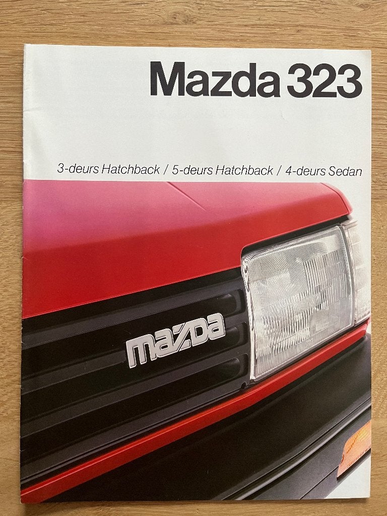 Autofolder/Brochure Mazda 323 1985 04/85, Ophalen of Verzenden, Nieuw, Mazda