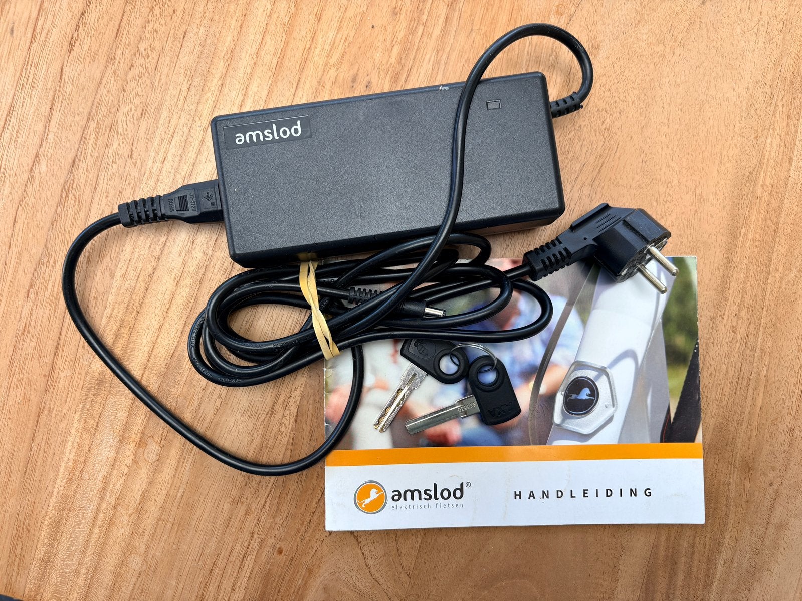 Foto 6 van Nette Amslod elektrische fiets weinig km goede zware accu