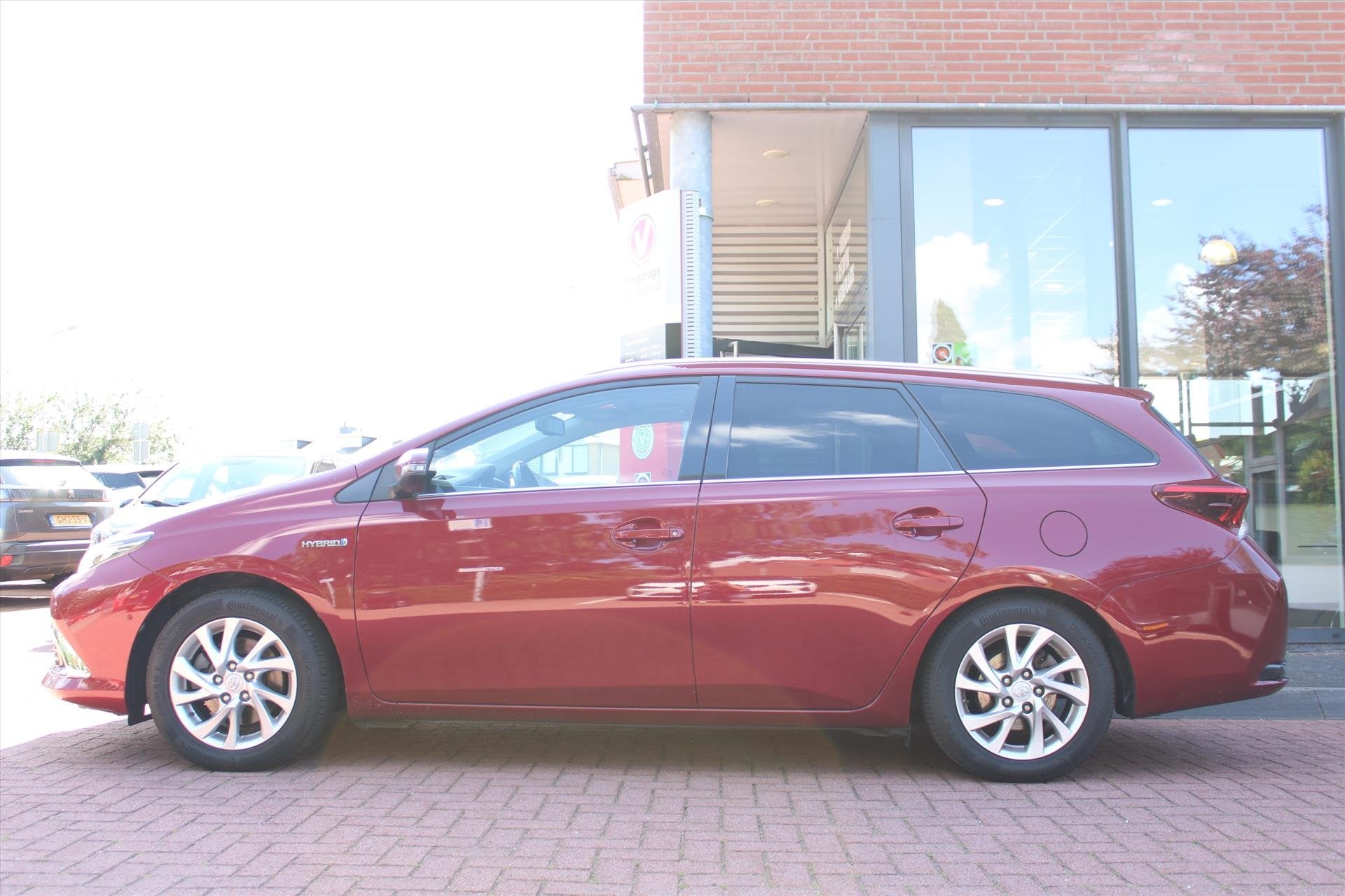 Toyota Auris SW 1.8 Hybrid *Executive* | Panorama | Camera |, 28 km/l, Gebruikt, Leder en Stof, Origineel Nederlands