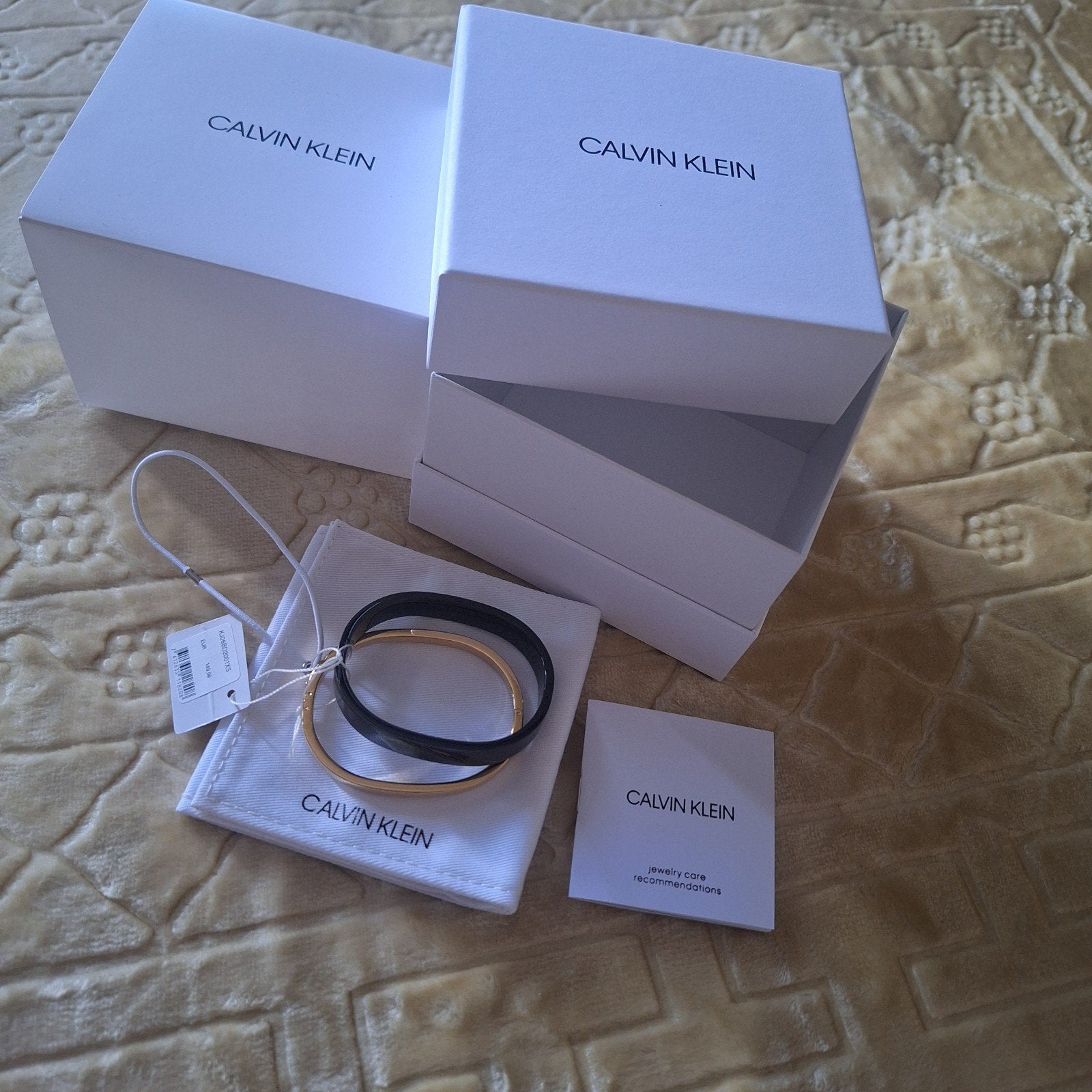 Calvin Klein Armbanden Set - Zwart & Goud (Nieuw), Ophalen of Verzenden, Nieuw, Goud, Staal