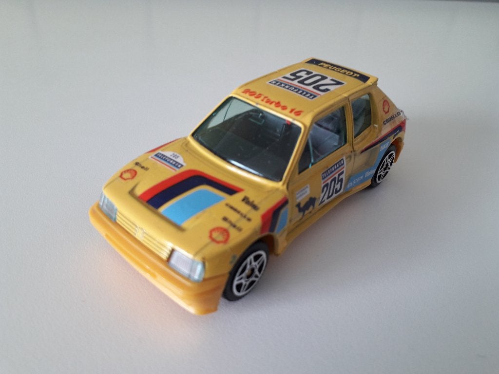 peugeot 205 turbo 16         burago, Ophalen of Verzenden, Zo goed als nieuw, Auto, Overige merken