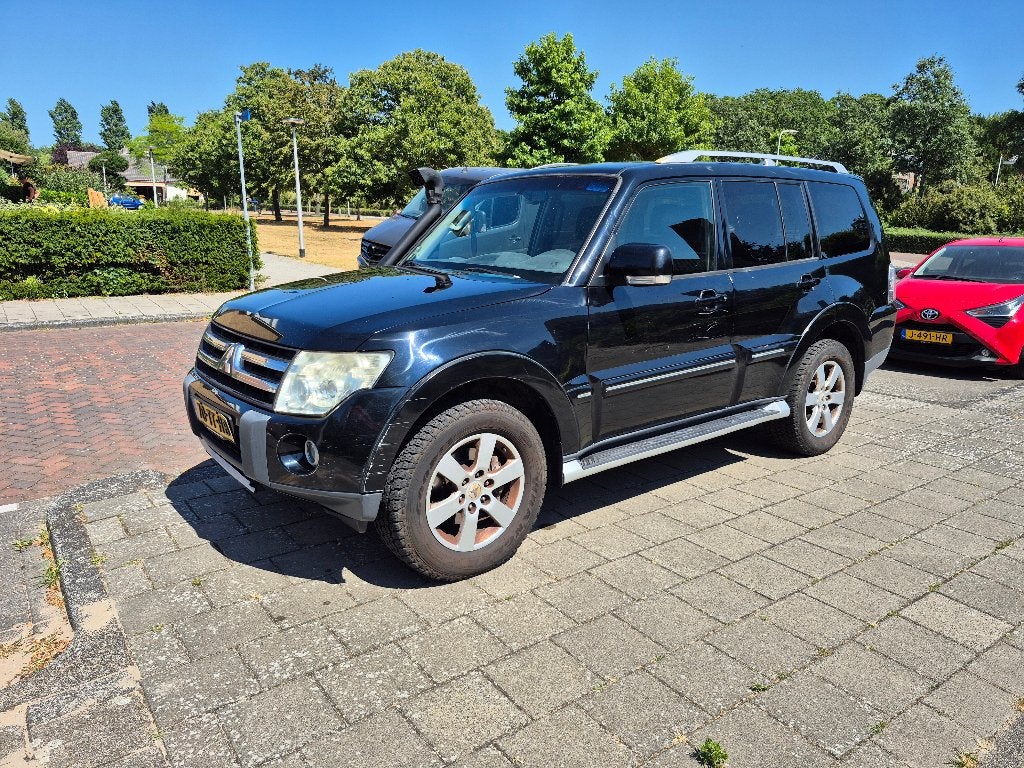 Mitsubishi Pajero 3.2 Di-d 125KW LWB AUT 2007 Zwart, Auto's, Automaat, Stof, Zwart, 4 cilinders