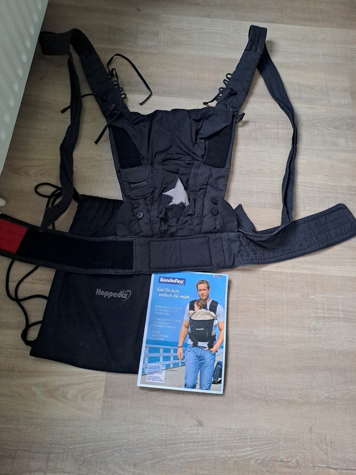 Bondolino Hoppediz Draagzak Zwart met Ster, Kinderen en Baby's, Babydragers en Draagdoeken, Overige merken, Gebruikt, Buik of Rug