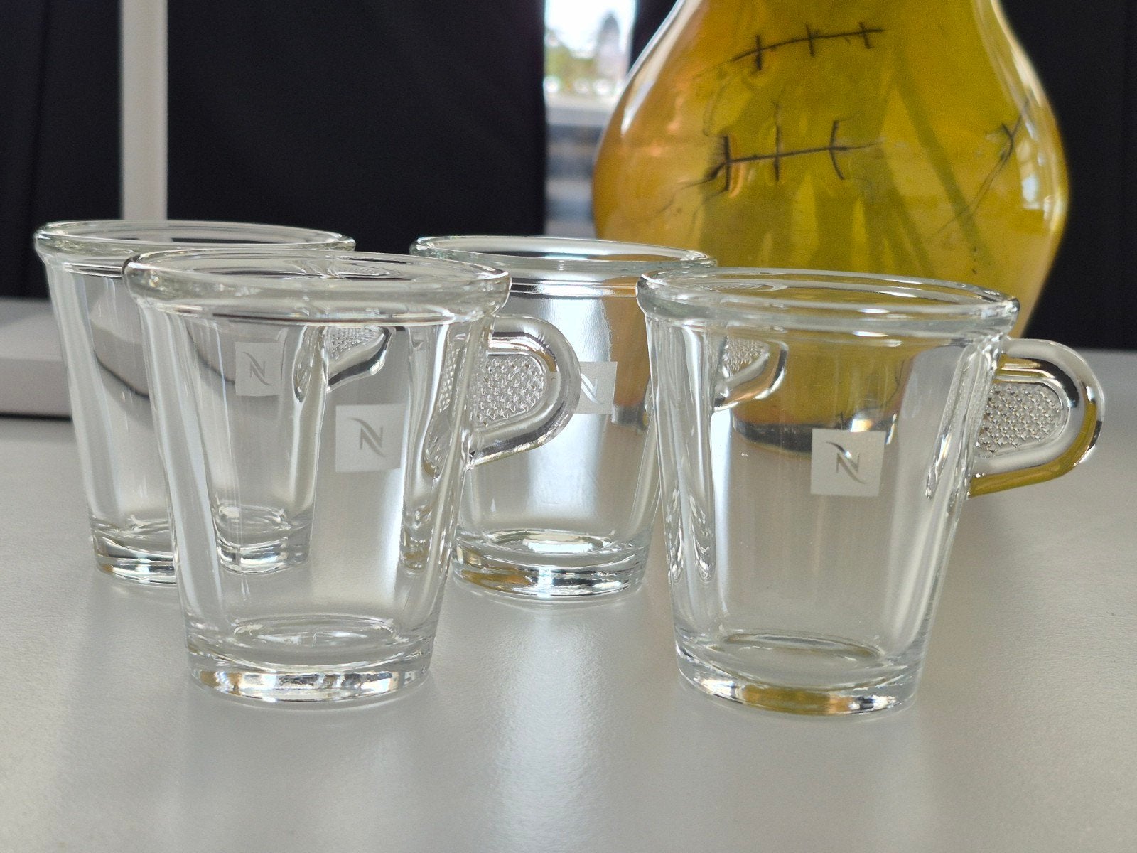 Nespresso espresso kopje koffie glas 4x als nieuw origineel, Ophalen of Verzenden, Overige stijlen, Kop(pen) en/of Schotel(s)
