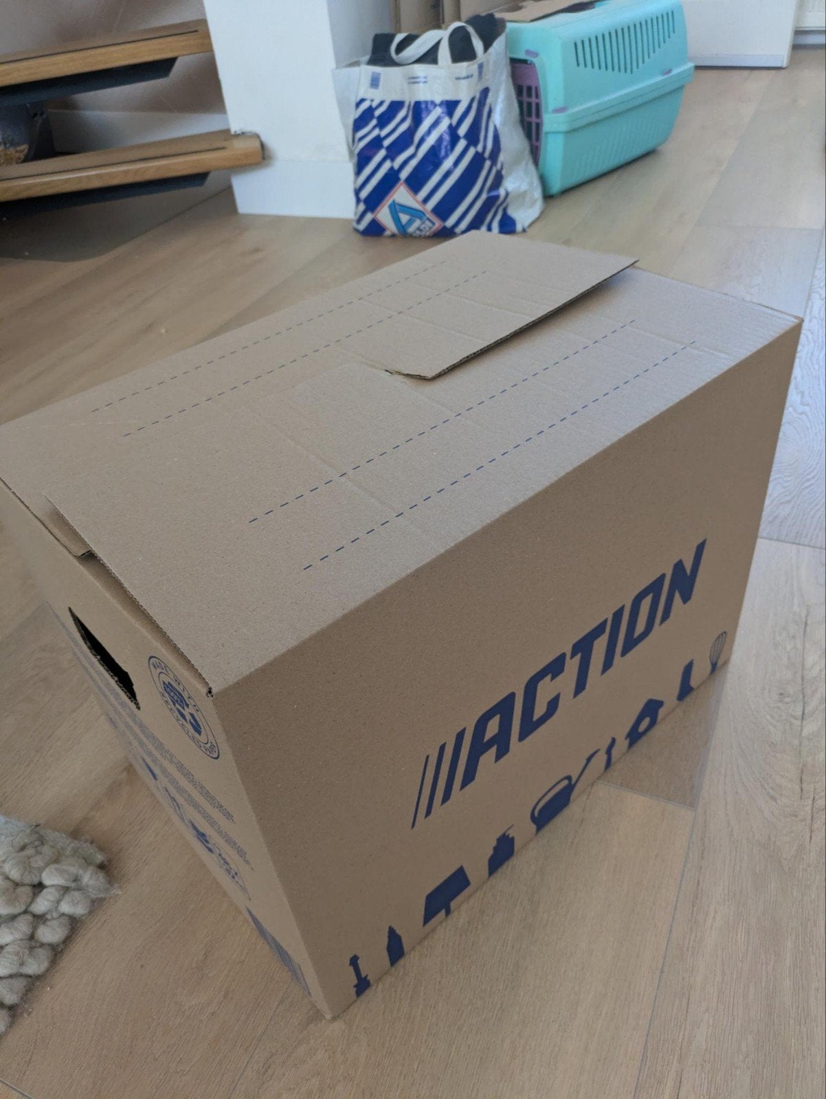 5 action verhuisdozen, Ophalen