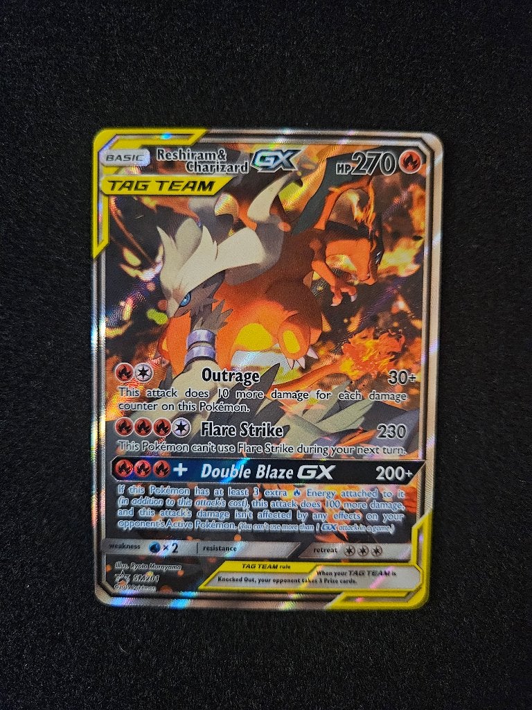 Reshiram & Charizard GX (SM201) Full Art Promo Pokémon Kaart, Ophalen of Verzenden, Zo goed als nieuw, Losse kaart, Foil