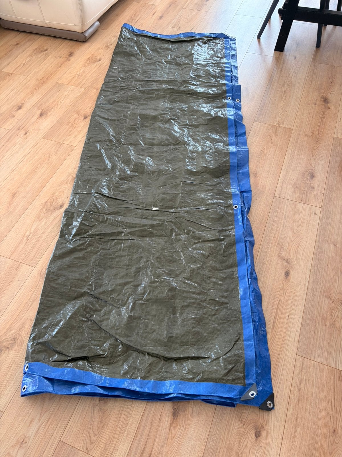 waterproof tarpaulin, Ophalen, Zo goed als nieuw